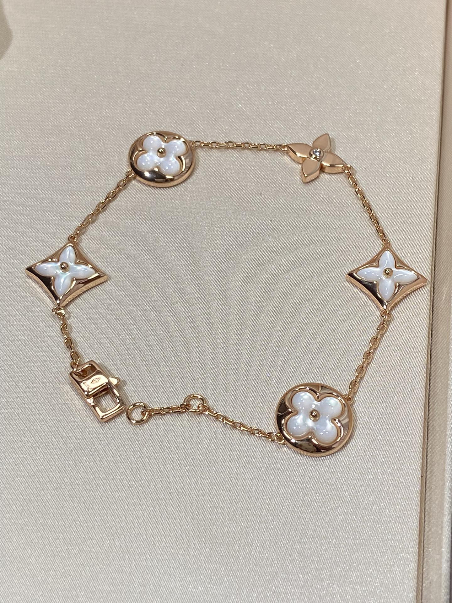 [moco jewelrys]STAR AND SUN 5 MOTIF MOP PINK GOLD BRACELET
