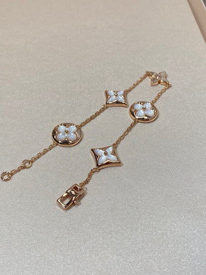 [moco jewelrys]STAR AND SUN 5 MOTIF MOP PINK GOLD BRACELET