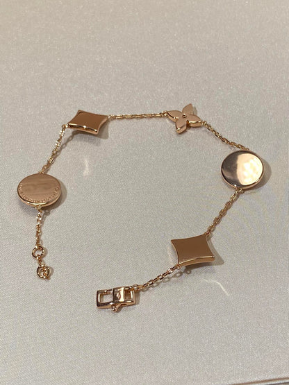 [moco jewelrys]STAR AND SUN 5 MOTIF MOP PINK GOLD BRACELET