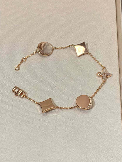 [moco jewelrys]STAR AND SUN 5 MOTIF MOP PINK GOLD BRACELET